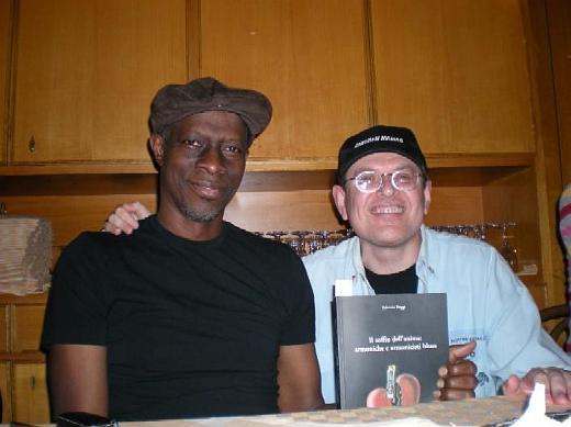 Keb Mo and Fabrizio Poggi with his book